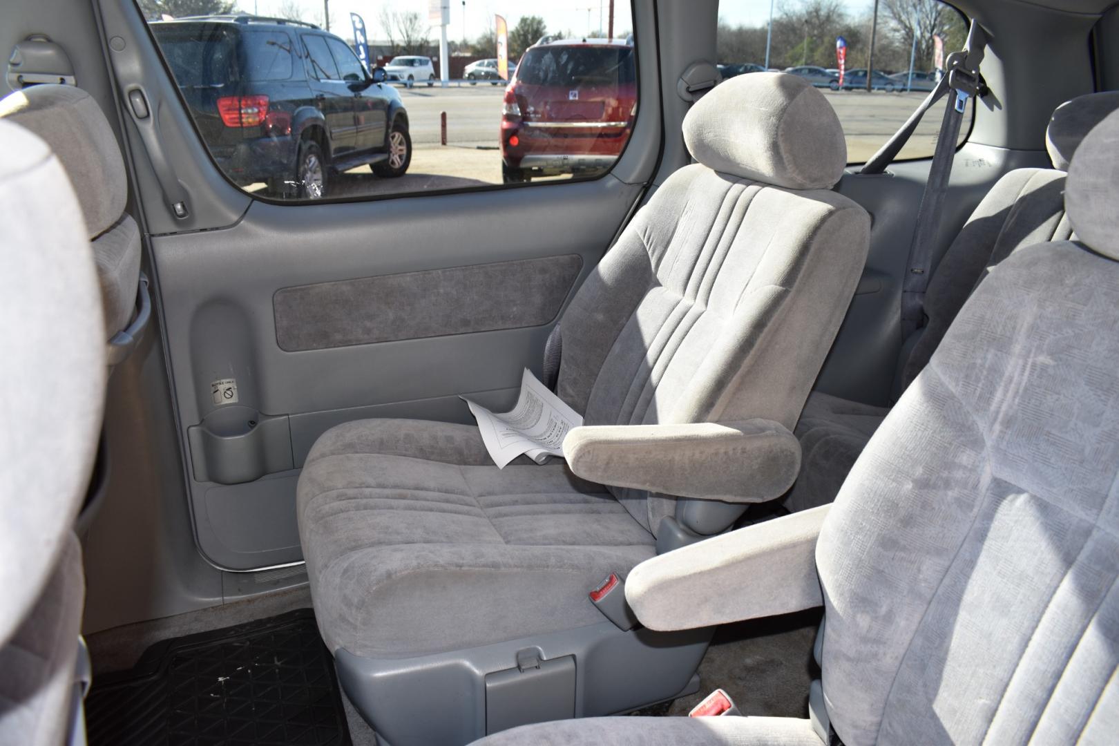 2002 Silver /Gray Toyota Sienna LE (4T3ZF13C42U) with an 3.0L V6 DOHC 24V engine, 4-Speed Automatic Overdrive transmission, located at 5925 E. BELKNAP ST., HALTOM CITY, TX, 76117, (817) 834-4222, 32.803799, -97.259003 - Buying a 2002 Toyota Sienna Van/Minivan can be a practical choice for several reasons: Reliability: Toyota vehicles are renowned for their reliability, and the Sienna is no exception. It's known to have a strong engine and durable construction, which means it can last for many miles with proper m - Photo#18